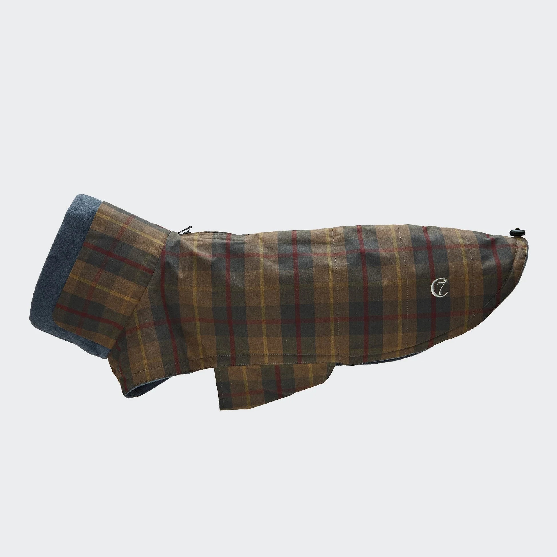 Premium tartan dog coat featuring weather-resistant fabric and adjustable fit.