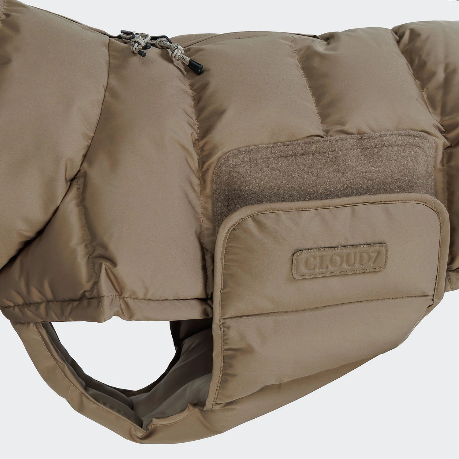 Beige dog coat with Cloud7 branding on a white background