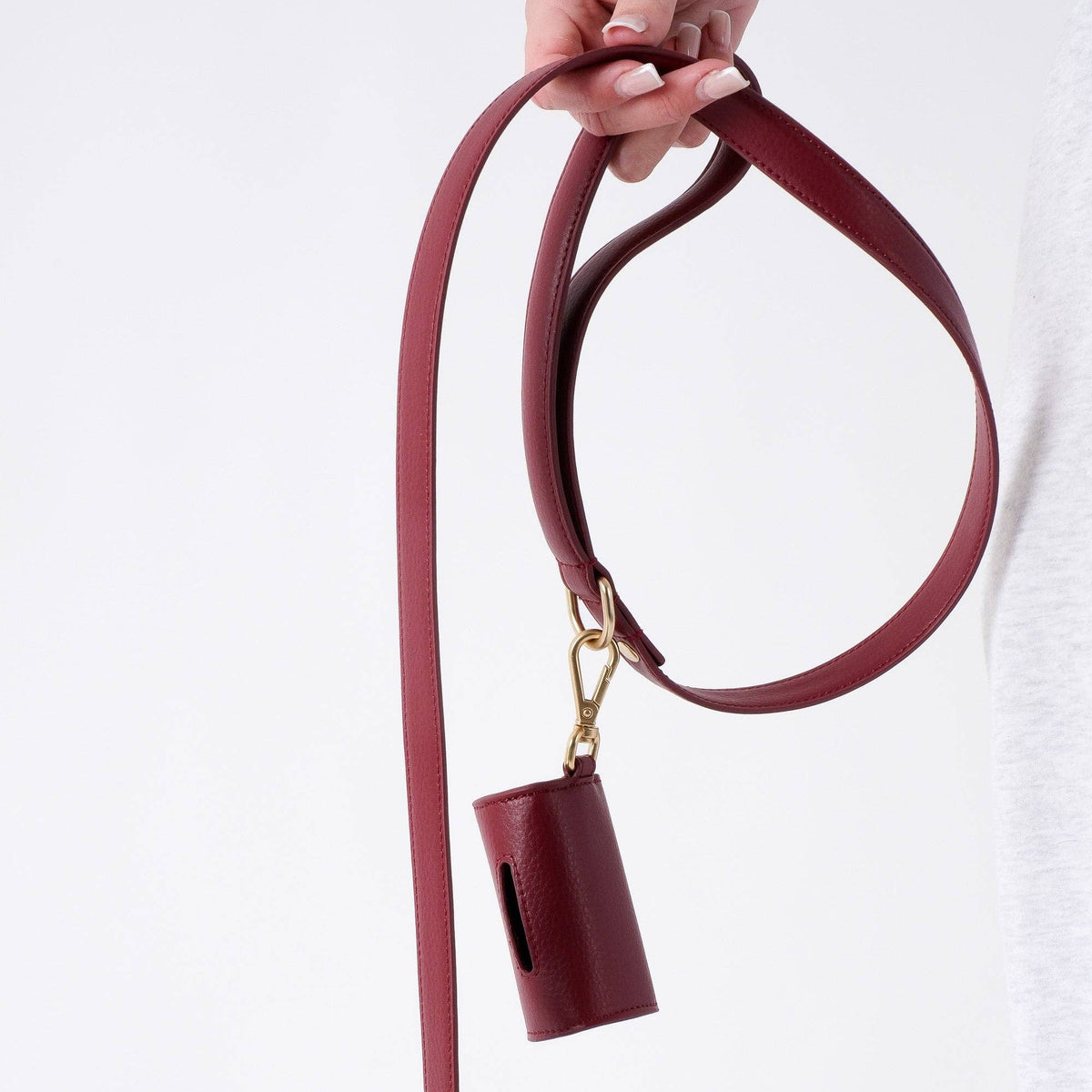 Luxury Merlot red dog poo bag holder in textured microfibre leather.