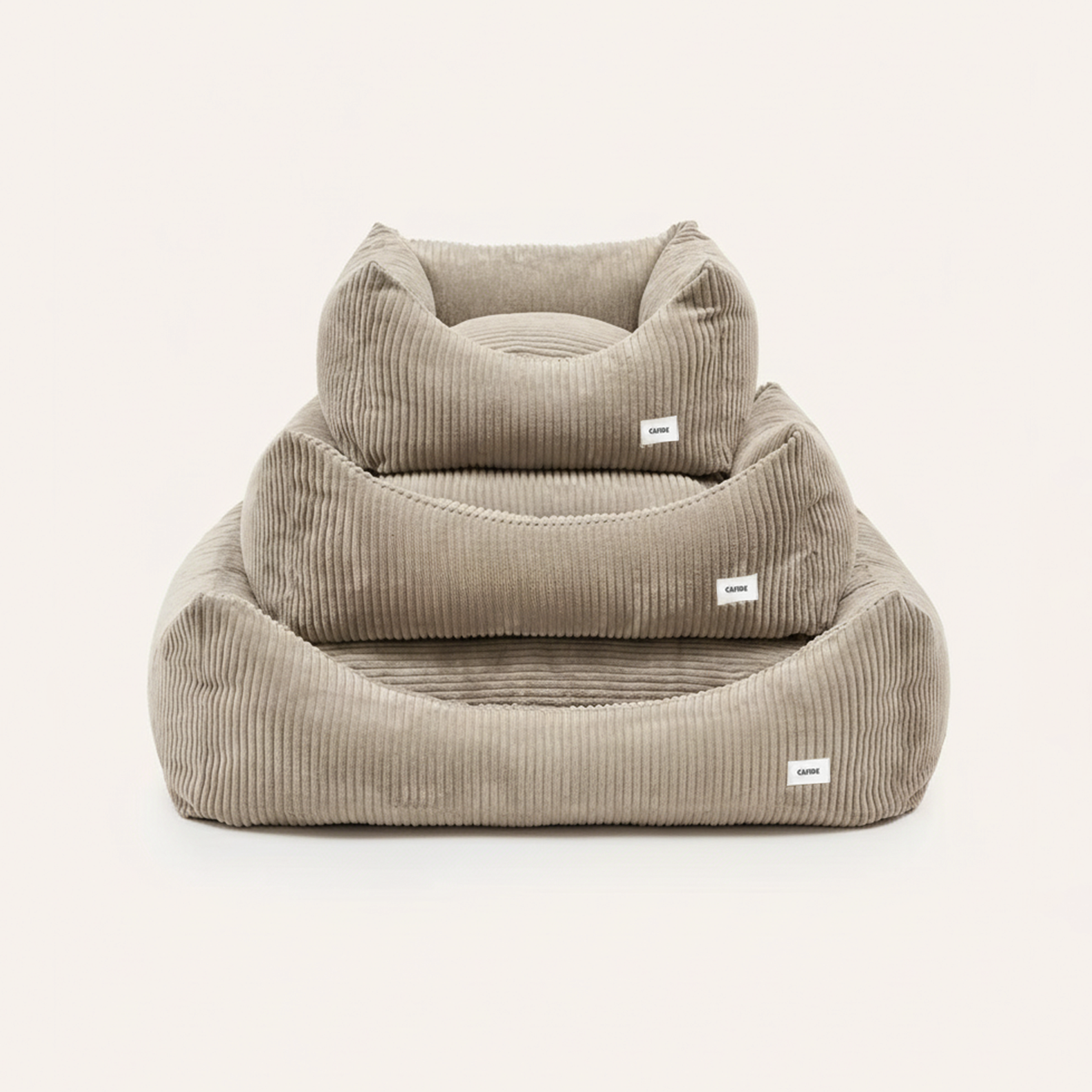 Contemporary dog bed with removable machine washable corduroy cover.