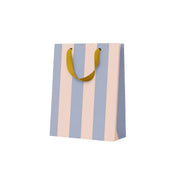 Colourful small gift bag with bold blue and pink stripes.