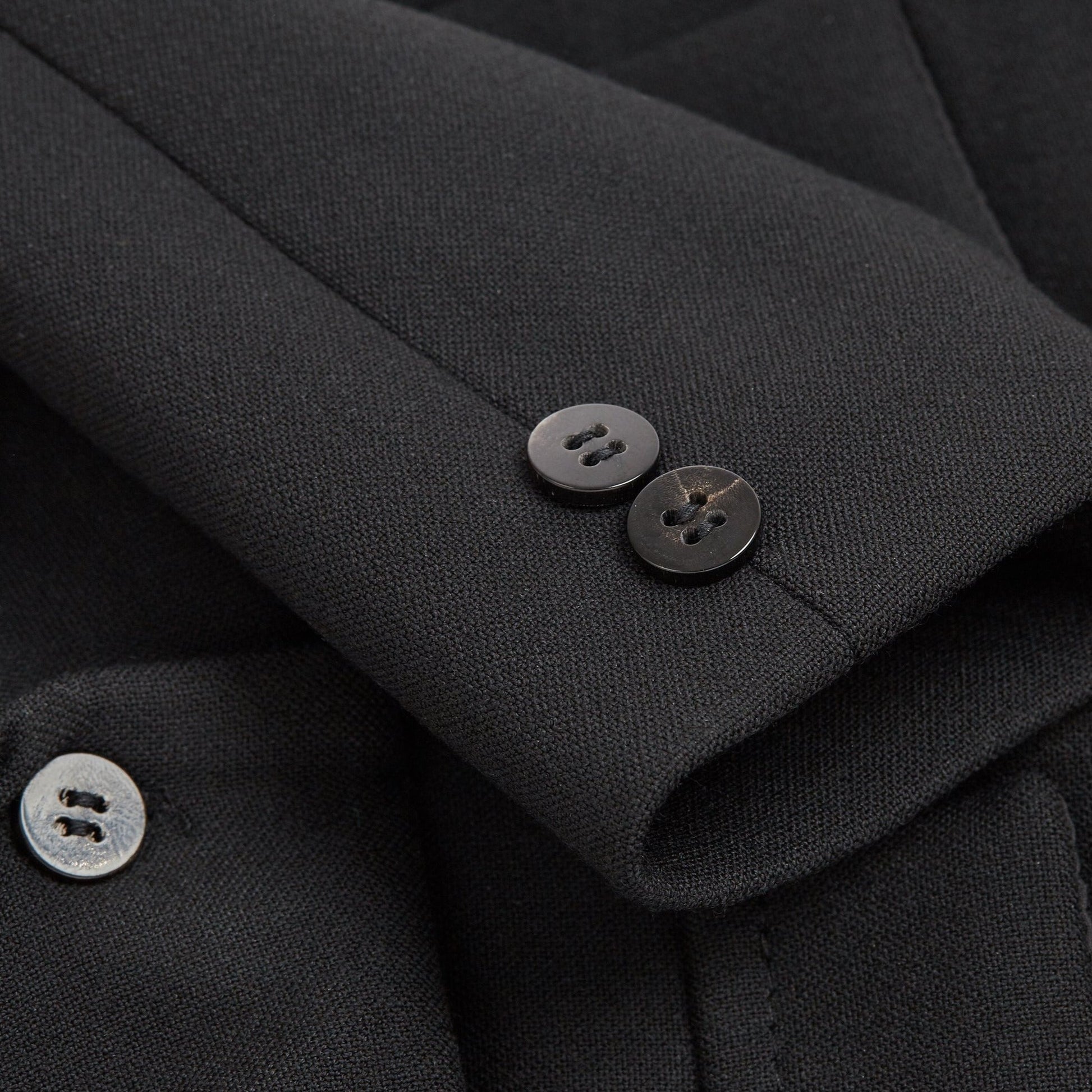 Black formal dog suit jacket with button fastening
