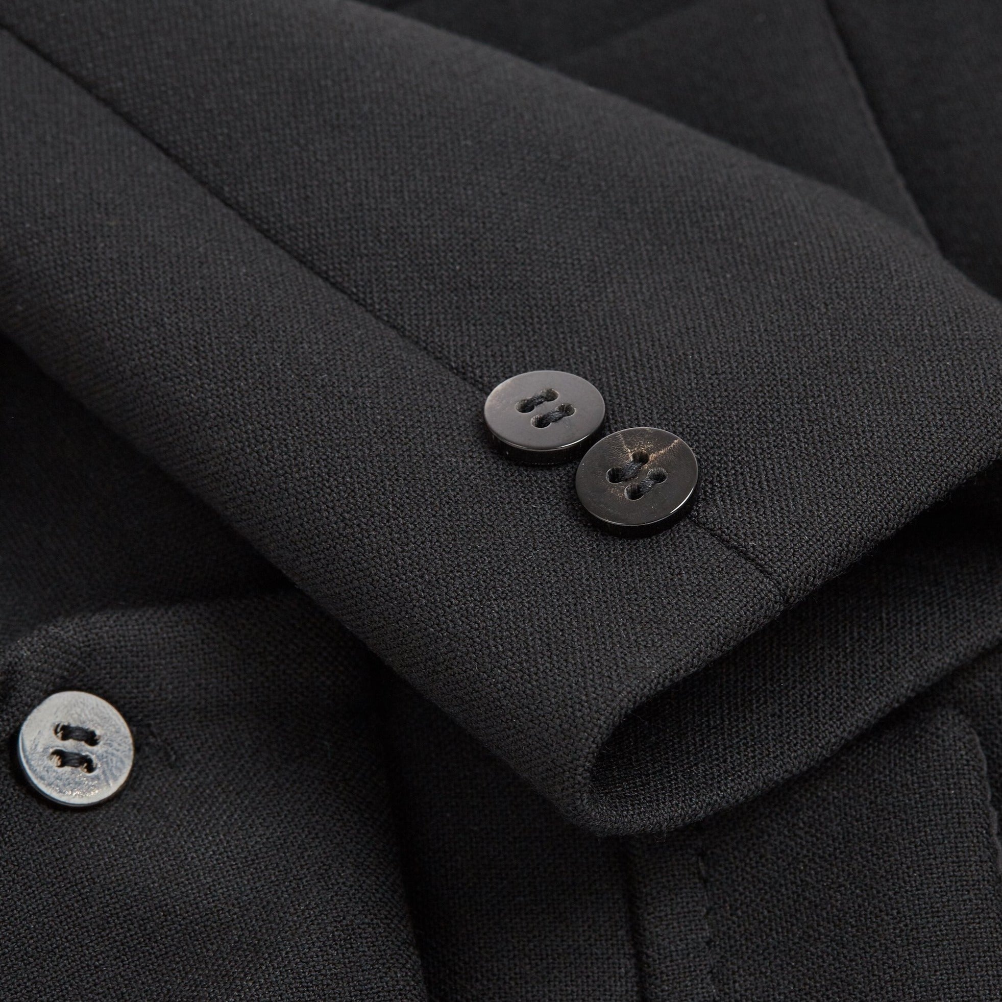 Black formal dog suit jacket with button fastening