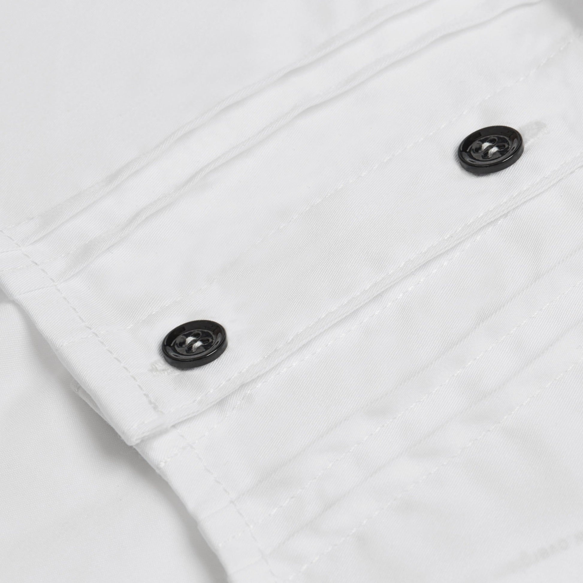 Smart white dog shirt with contrasting black buttons