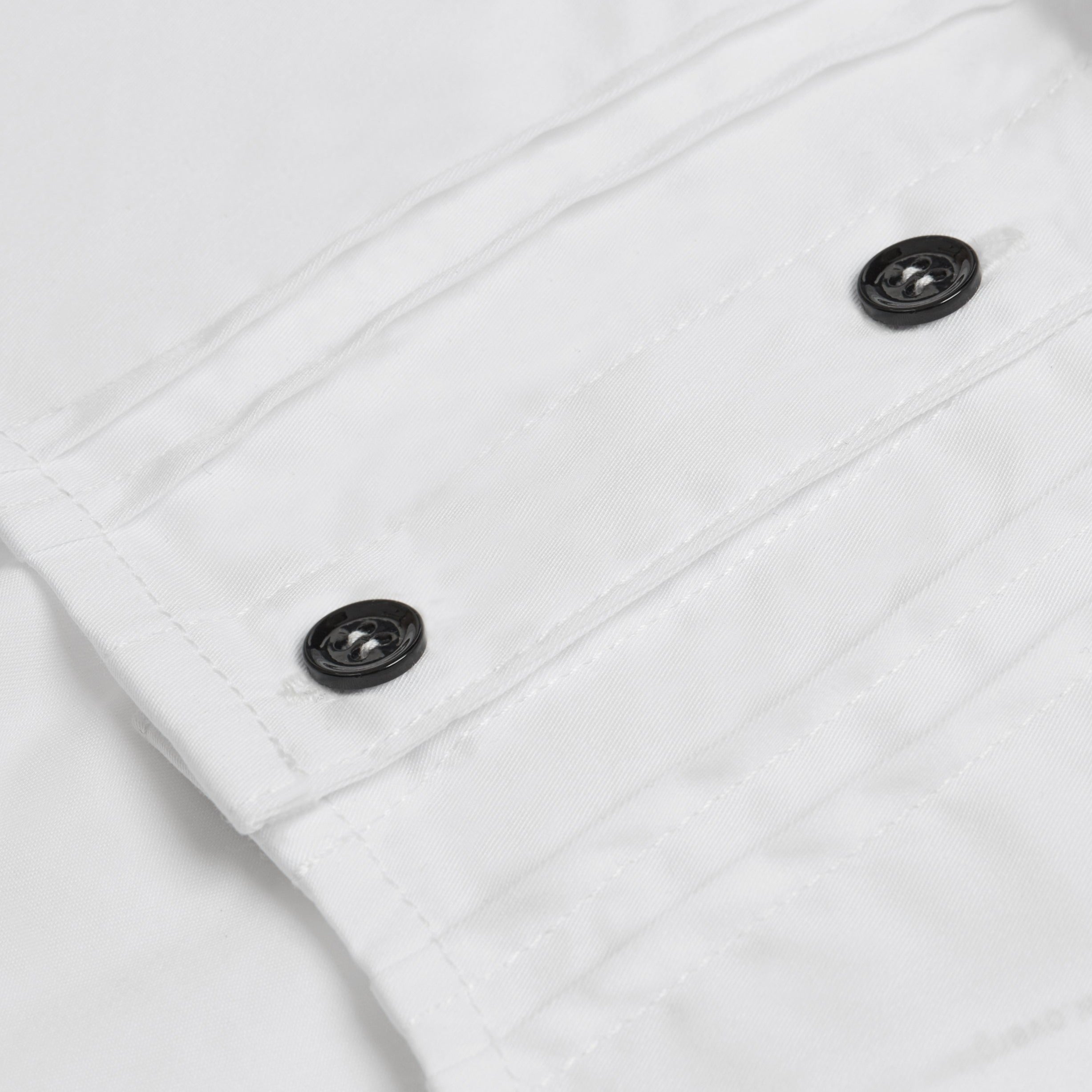 Smart white dog shirt with contrasting black buttons