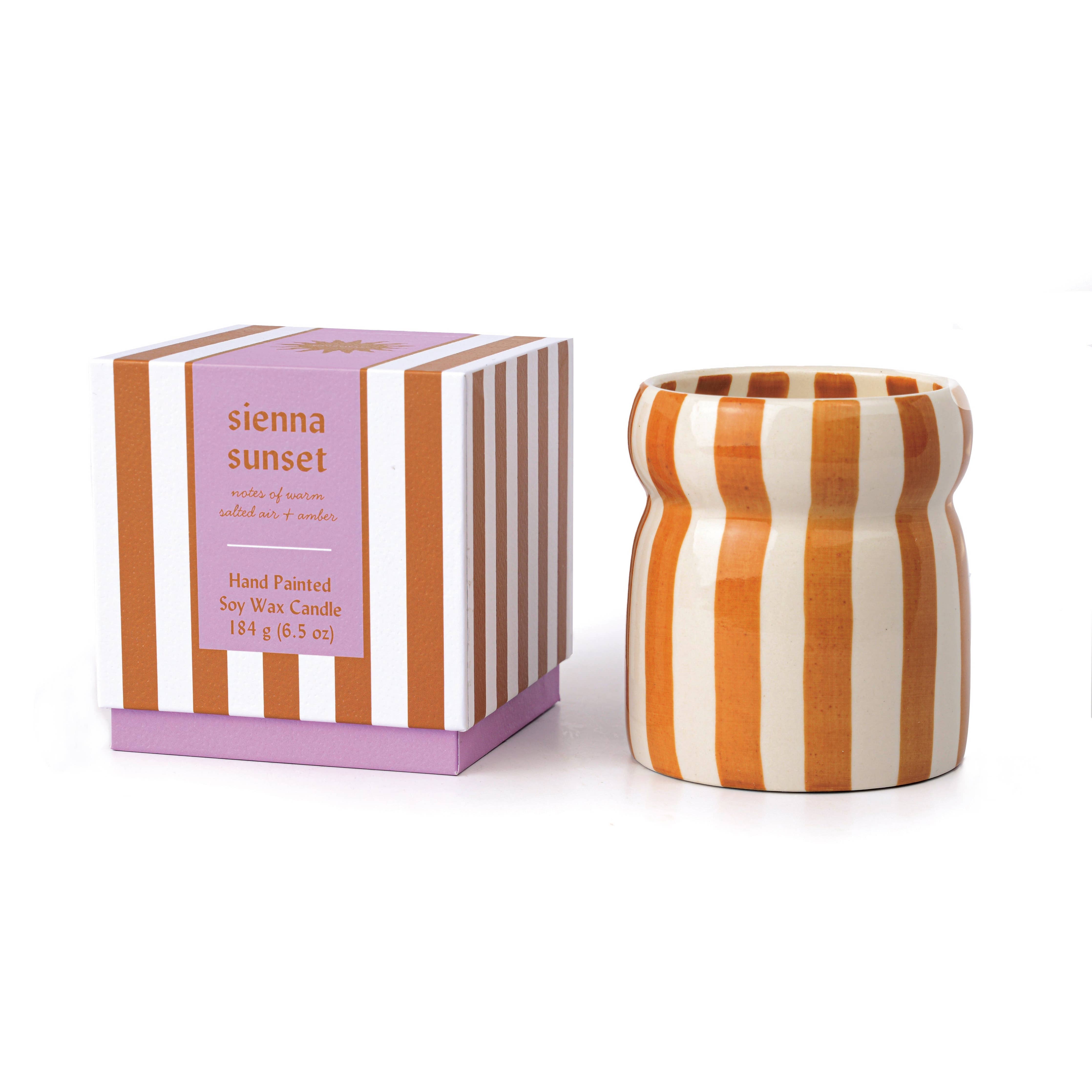 Paddywax Cabana Sienna Sunset hand-painted rust striped ceramic candle.