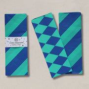 Petra Boase luxury leopard print tissue paper in cobalt blue and jade green.