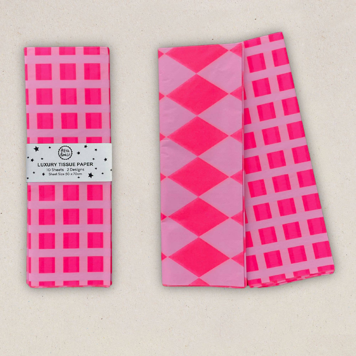 Petra Boase luxury tissue paper in Fluoro Pink and Lilac with Diamond Stripe and Grid patterns.