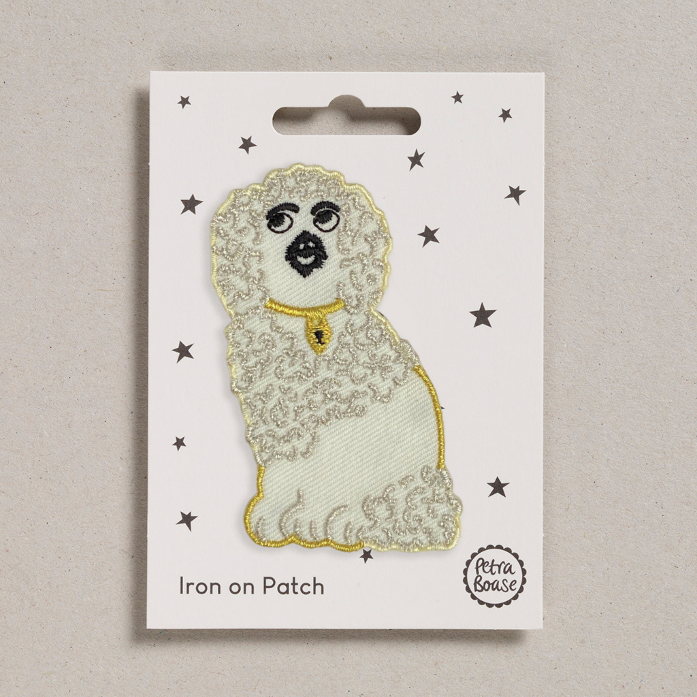 Petra Boase White Wally embroidered dog iron-on patch inspired by Staffordshire pottery.
