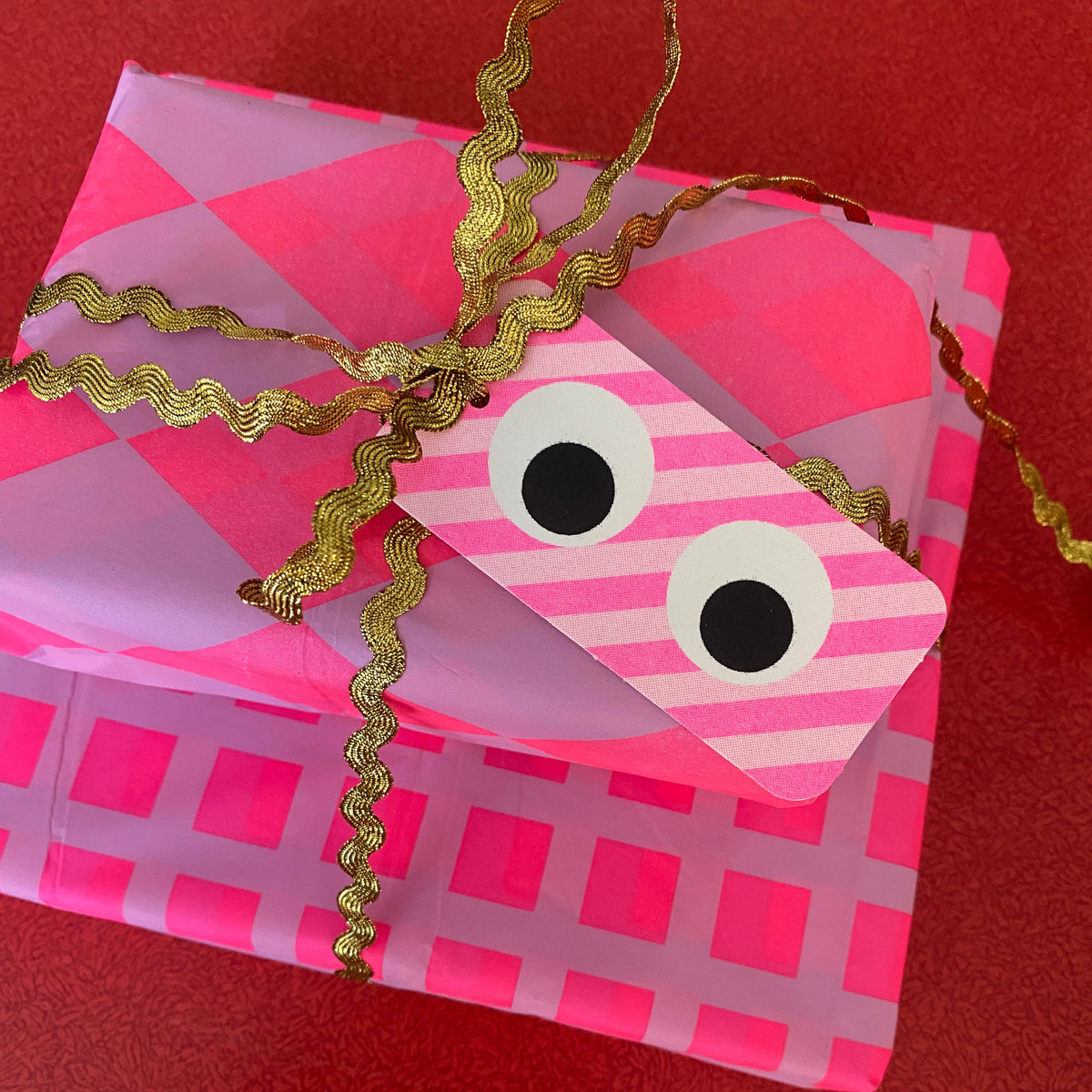 Colourful pink and lilac patterned tissue paper for luxury gift wrapping.
