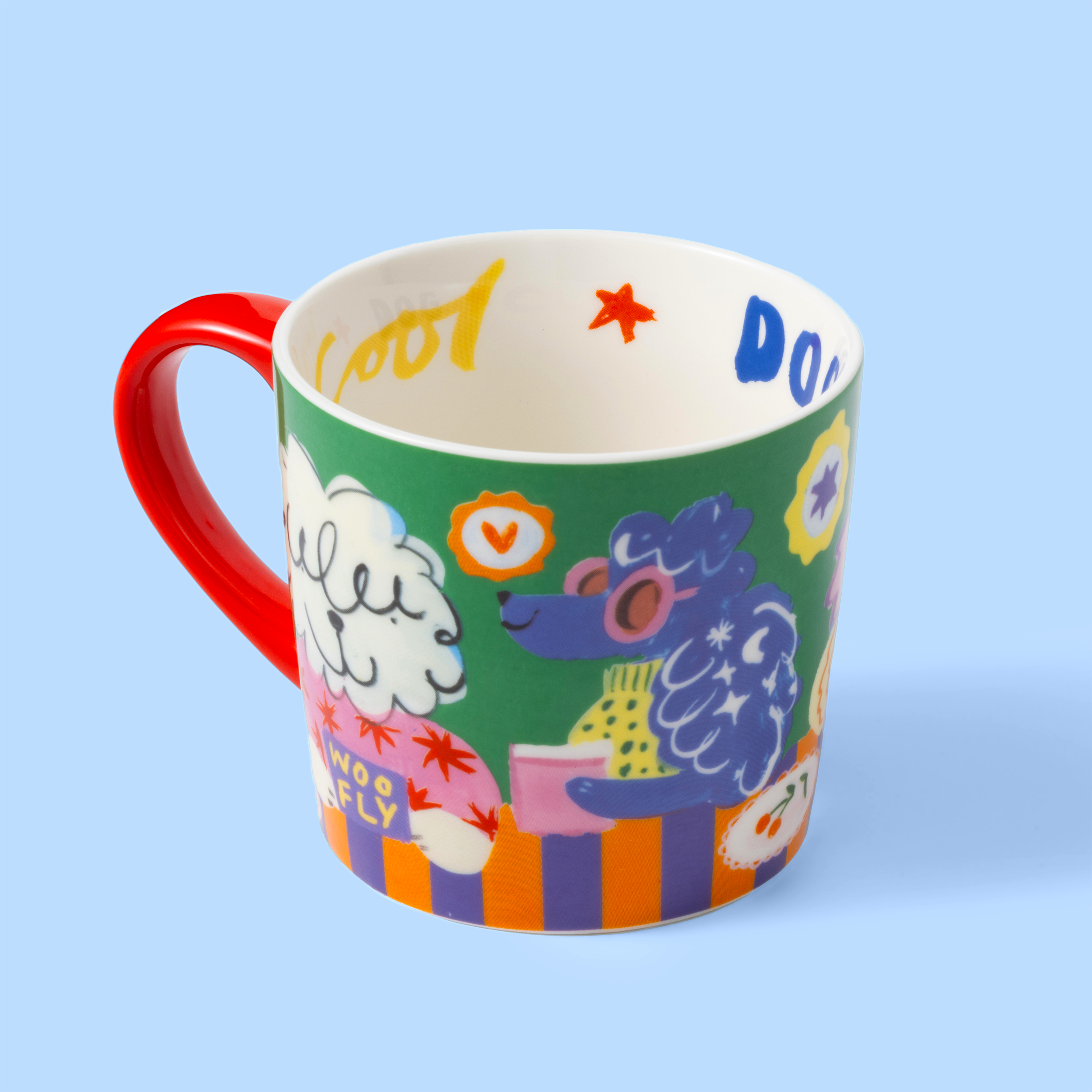 Colorful mug with cartoon characters on a light blue background