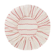 Projektityyny Marionette round linen cushion in pink and cream stripe with red scallop embroidery.