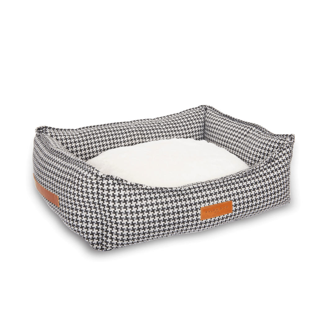 Kensington luxury dog bed with houndstooth outer and cosy faux-fur sleeping area