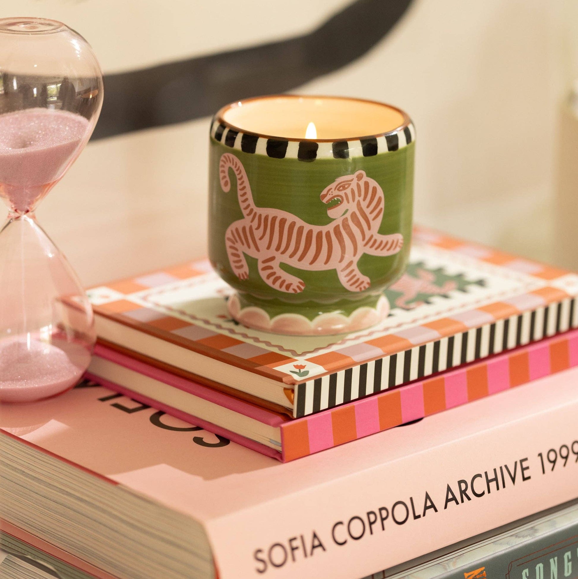 Hand-painted Paddywax ceramic candle vessel designed to be reused as colourful home décor.