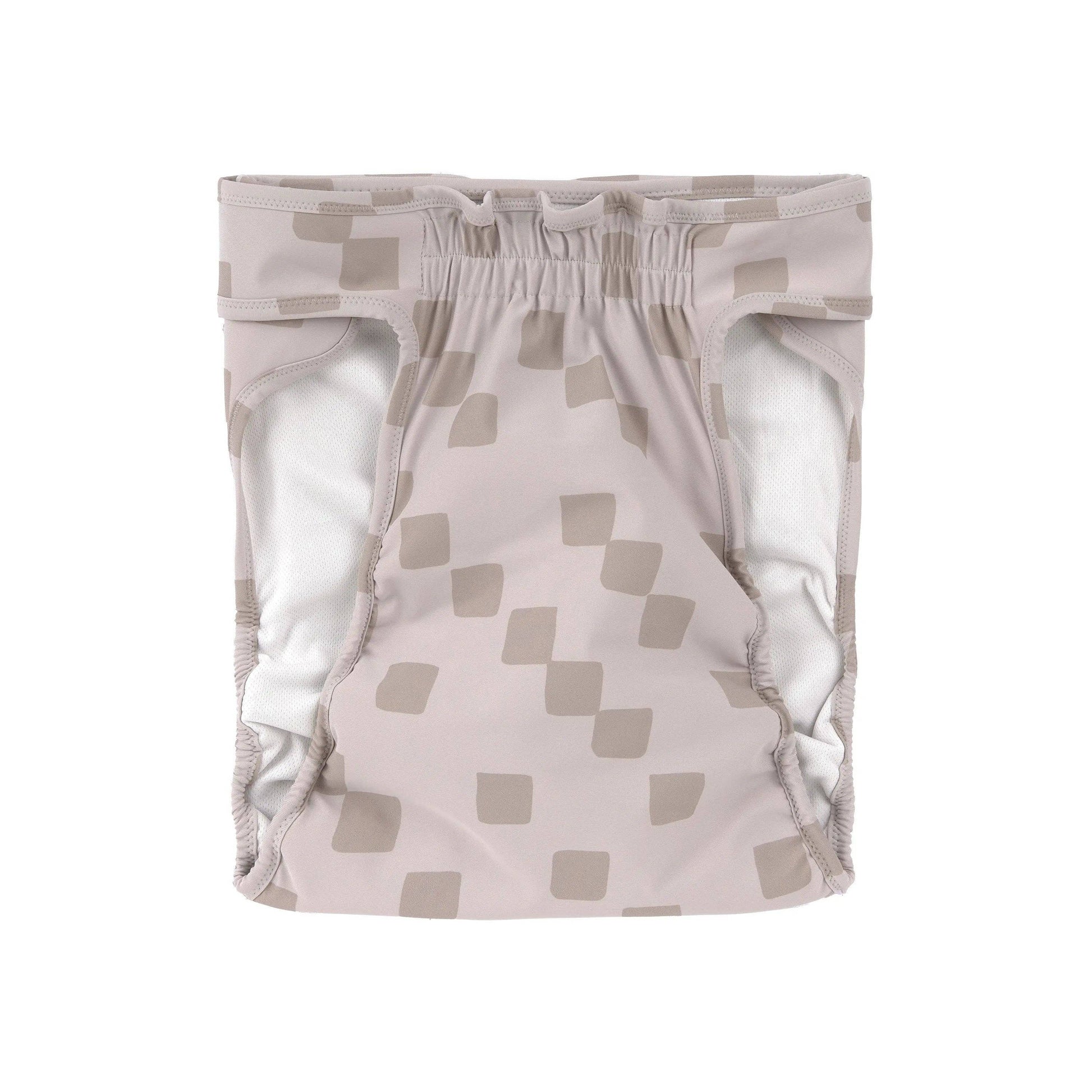 Washable dog heat pants featuring an absorbent lining and comfortable non-slip fit.