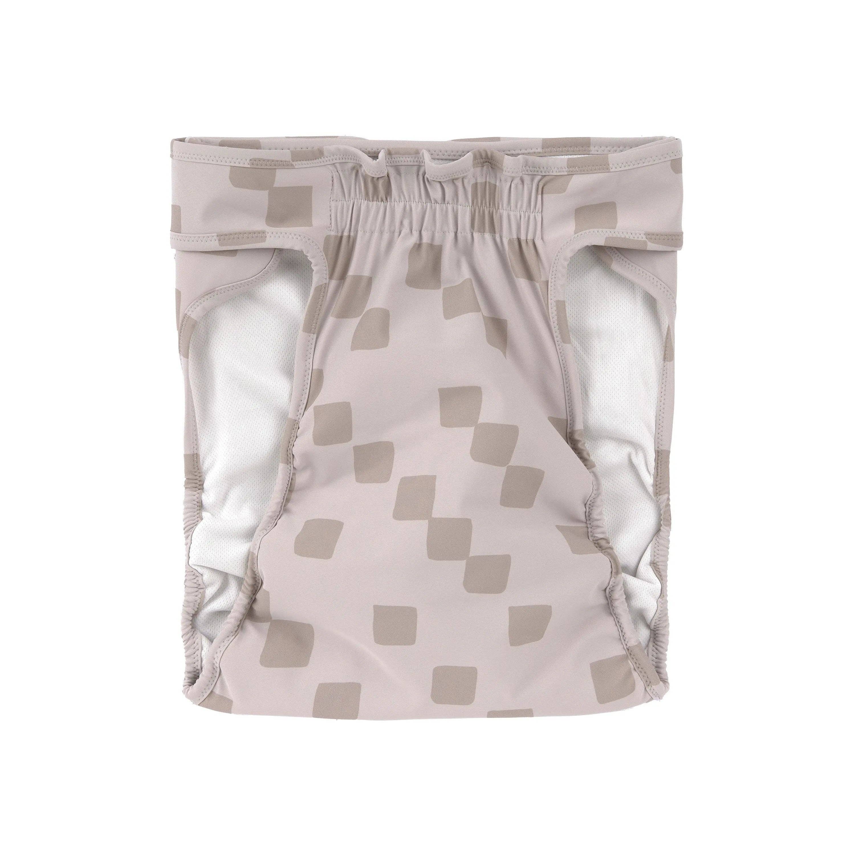 Washable dog heat pants featuring an absorbent lining and comfortable non-slip fit.