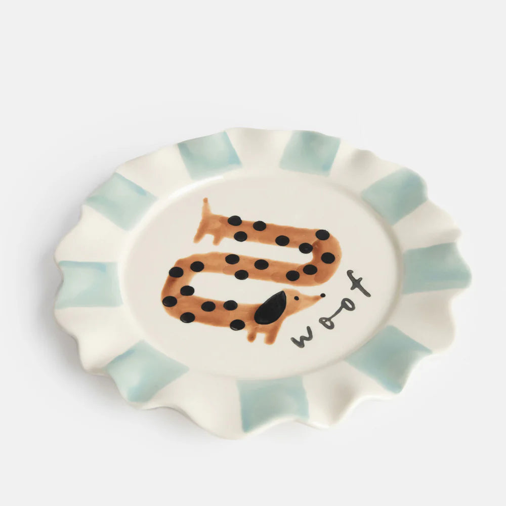 Decorative stoneware plate featuring a spotty sausage dog and Woof slogan.
