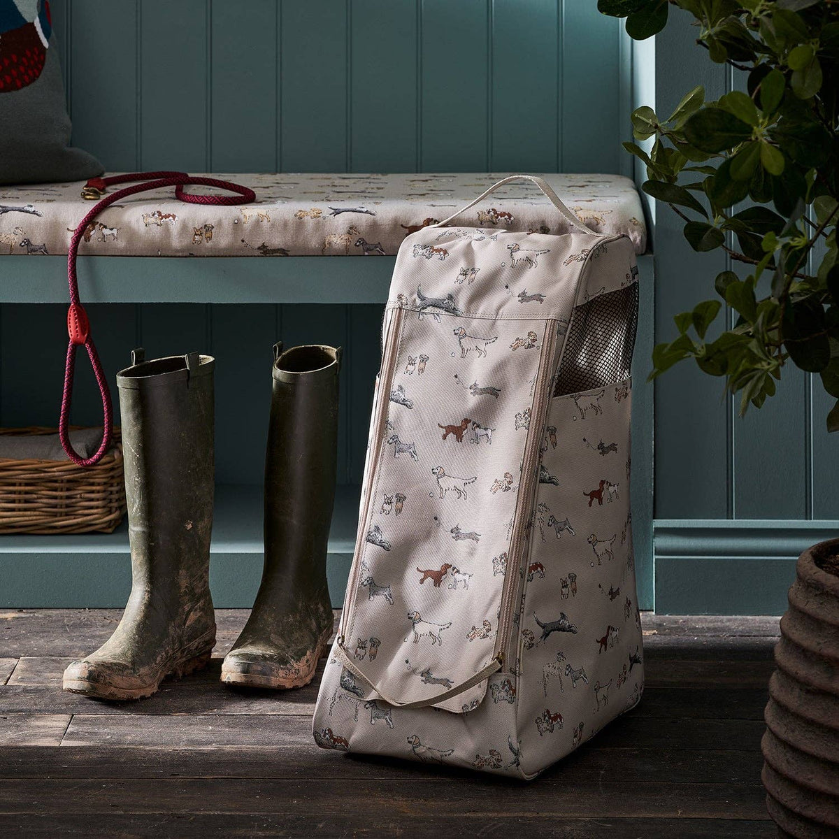 Sophie Allport Doggy Daycare boot bag for storing muddy boots and wellingtons.