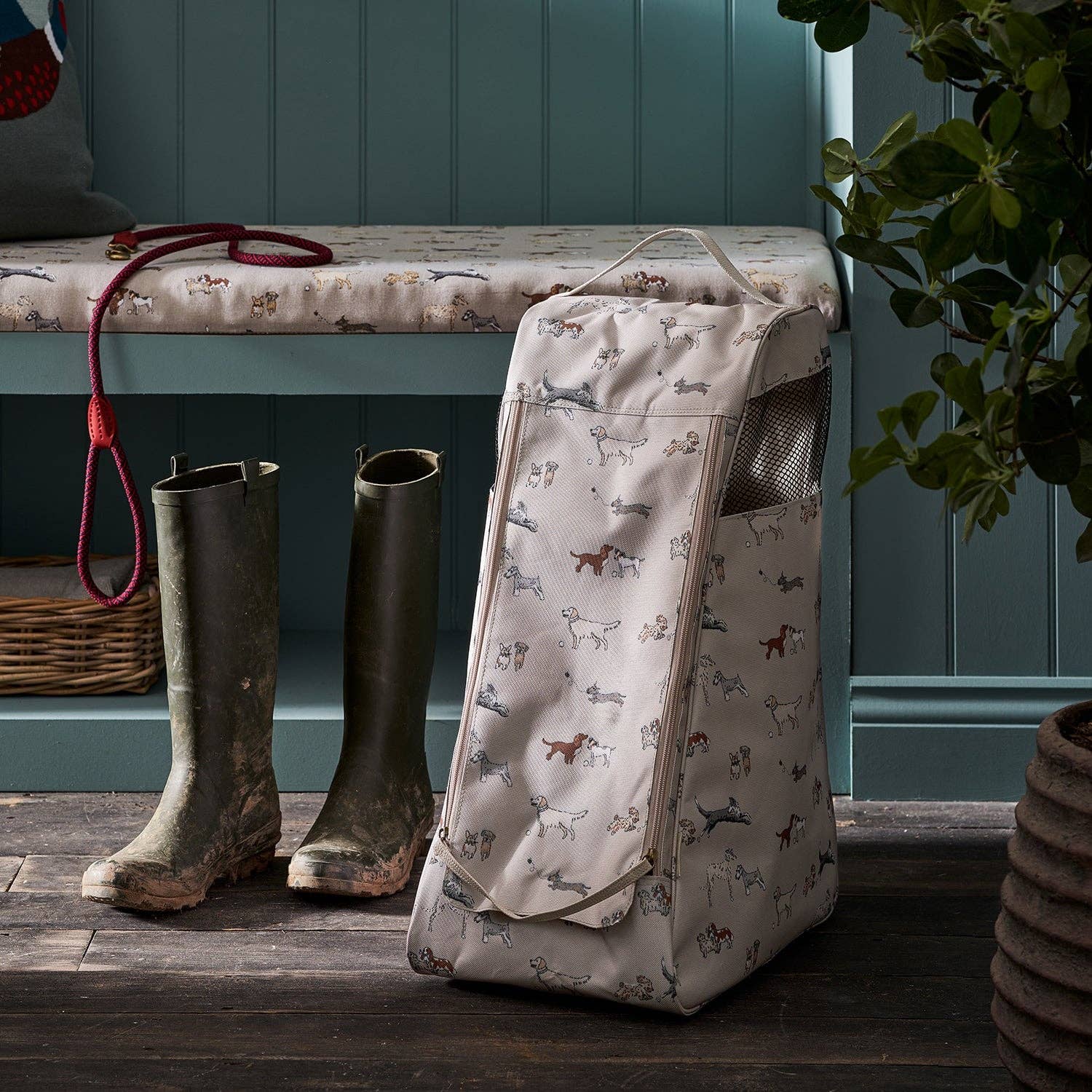 Sophie Allport Doggy Daycare boot bag for storing muddy boots and wellingtons.