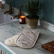 Sophie Allport Doggy Daycare double oven glove featuring playful illustrated dog breeds.