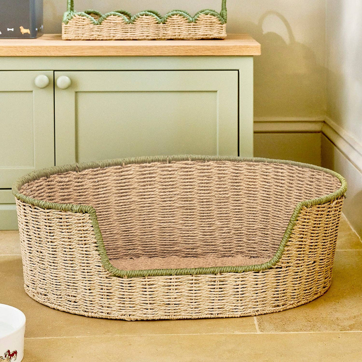 Handcrafted natural woven pet basket by Sophie Allport for dogs and cats.
