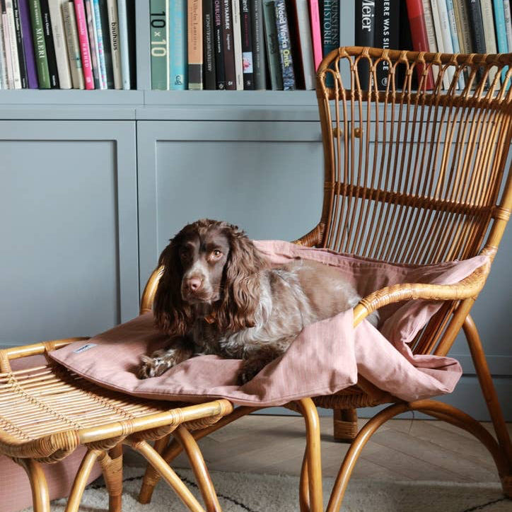 Dog relaxing on the Tadazhi Duvet Dog Blanket Chequered Rose at home