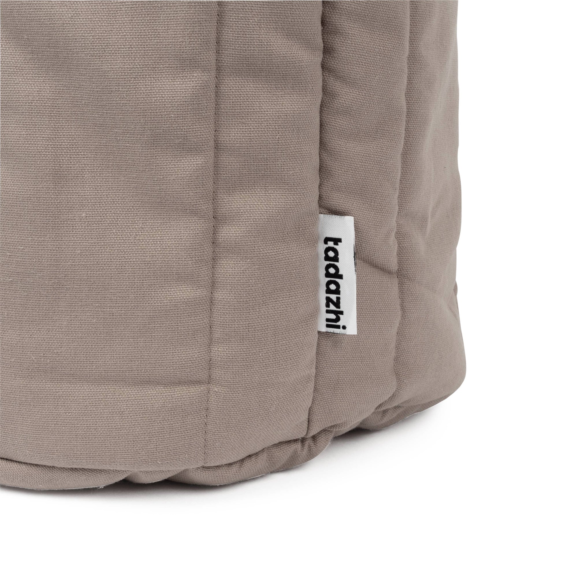 Organic cotton fabric detail on the Tadazhi Storage Basket Dark Sand