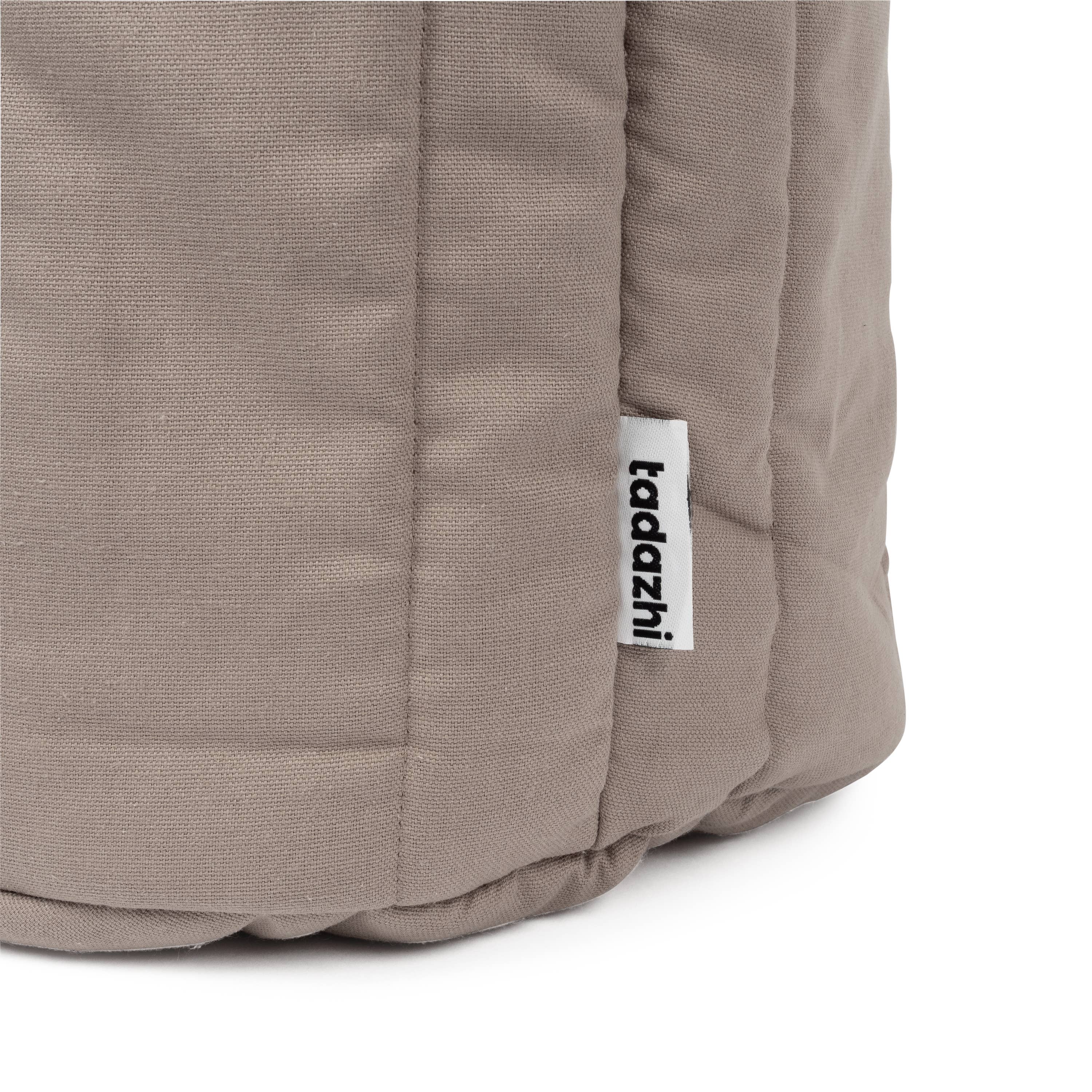 Organic cotton fabric detail on the Tadazhi Storage Basket Dark Sand