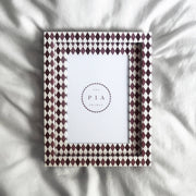 Handmade burgundy and blush harlequin fabric-wrapped picture frame by The Pia Frames.