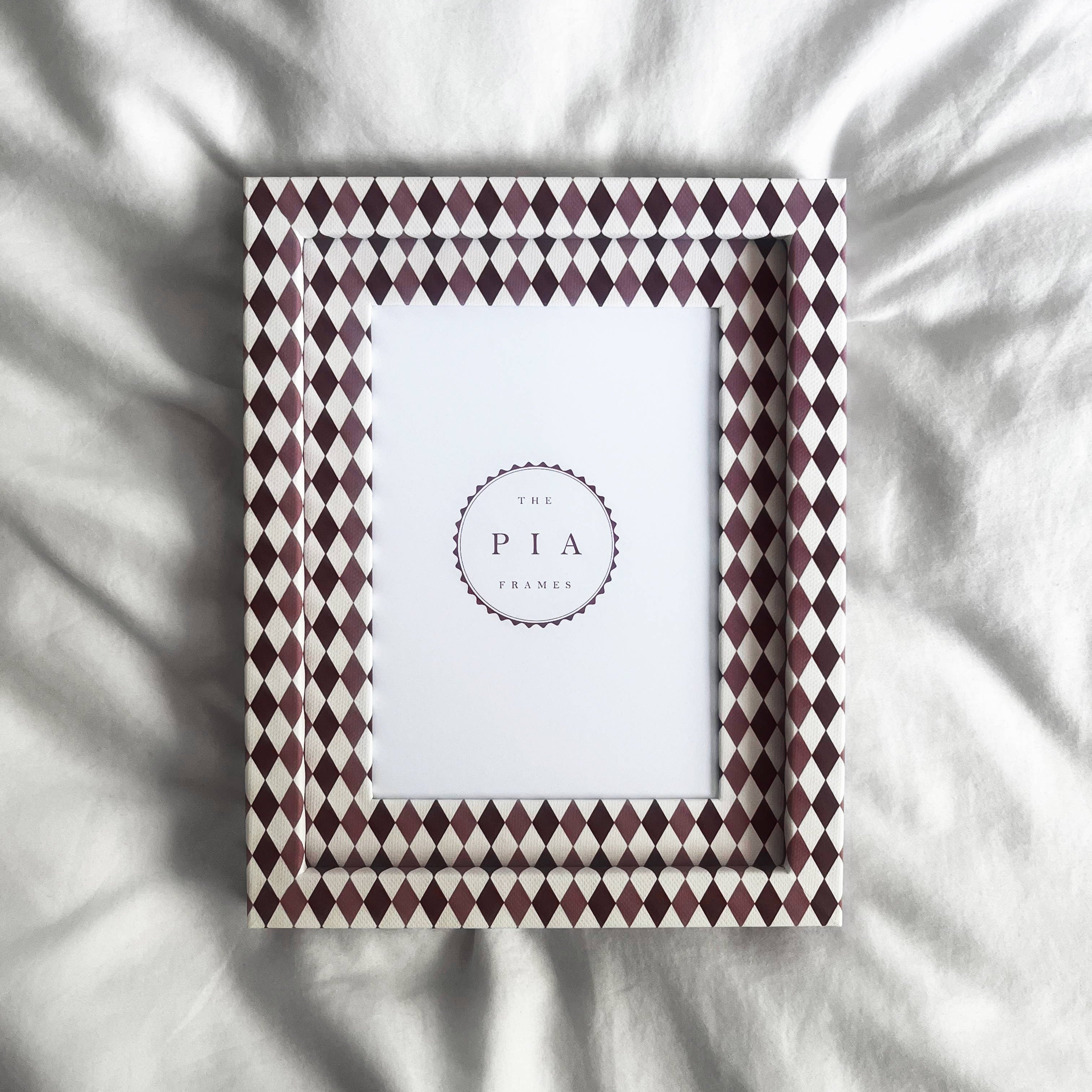 Handmade burgundy and blush harlequin fabric-wrapped picture frame by The Pia Frames.