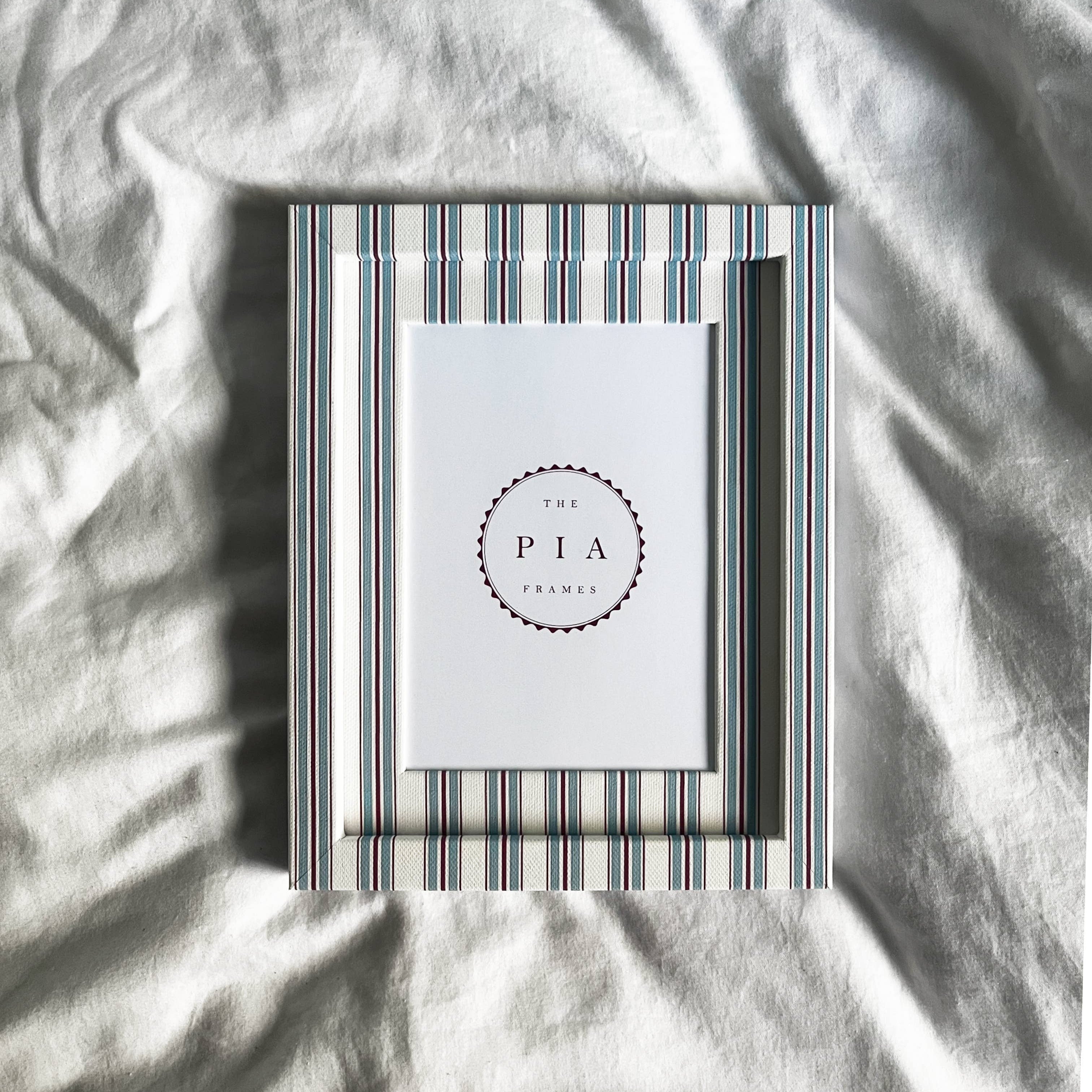 Handmade Sky & Scarlet Tailor Stripe picture frame by The Pia Frames.