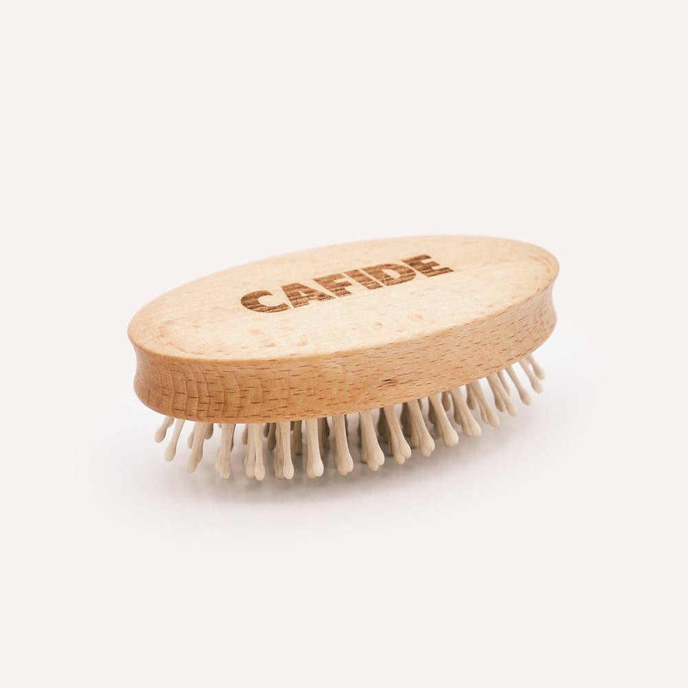 Premium dog massage brush designed to relax muscles and soothe dogs during grooming.