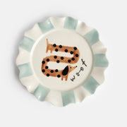 Hand-painted Woof Sausage Dog ceramic plate with scalloped blue rim from Bell & Beau.