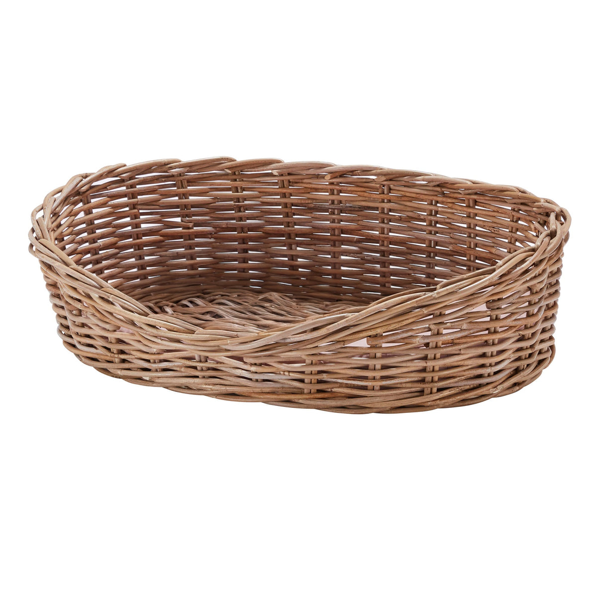 Natural oval rattan dog bed by Wovenhill