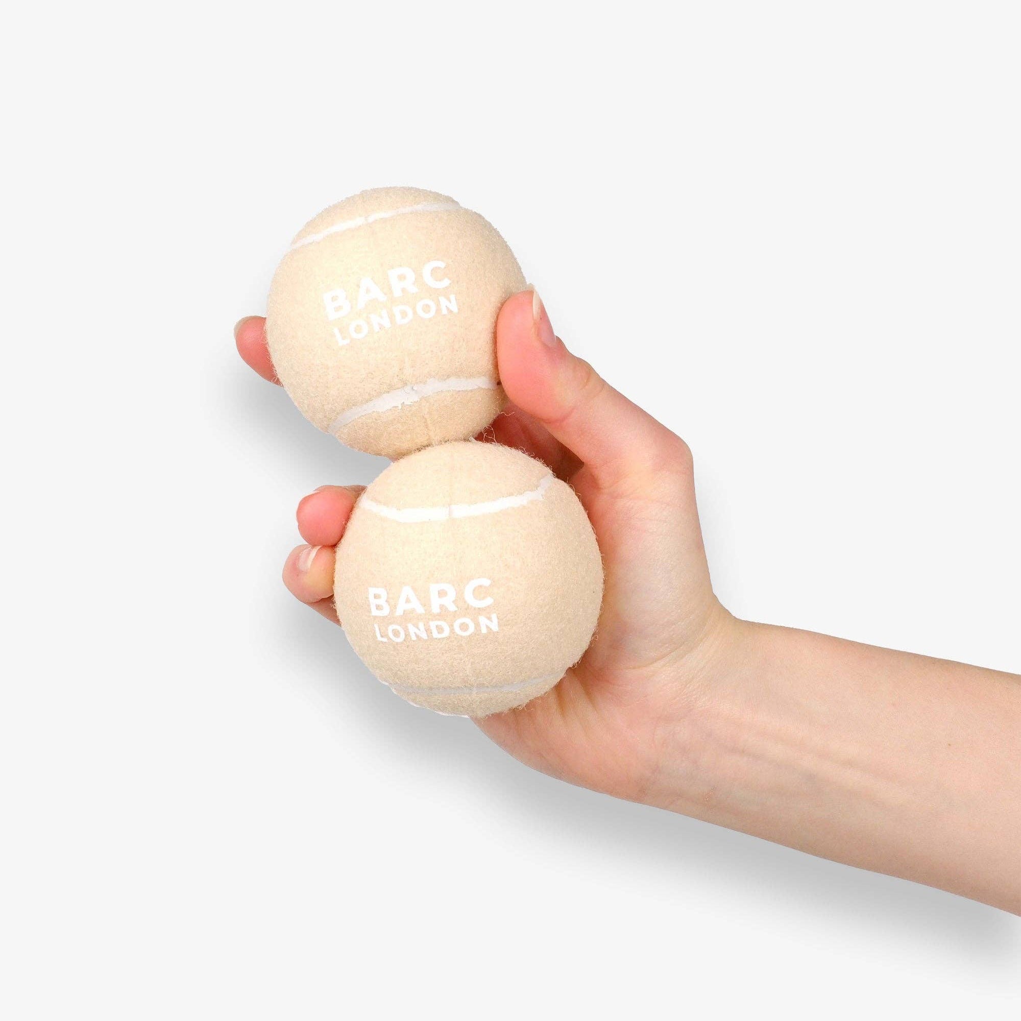 Close-up of the cream Dog Ball set by Barc London
