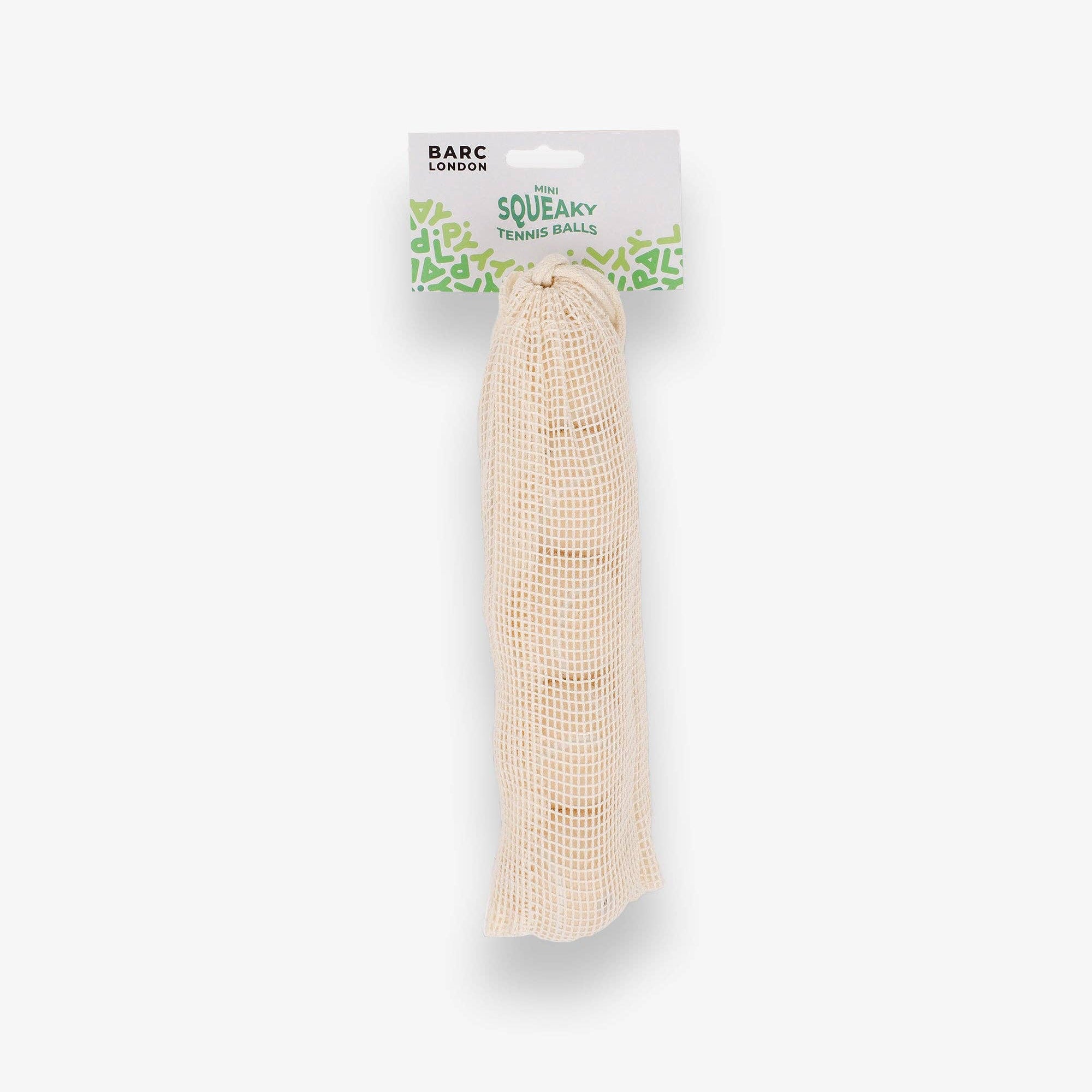 Cream Mini Dog Balls stored inside the Barc London net bag