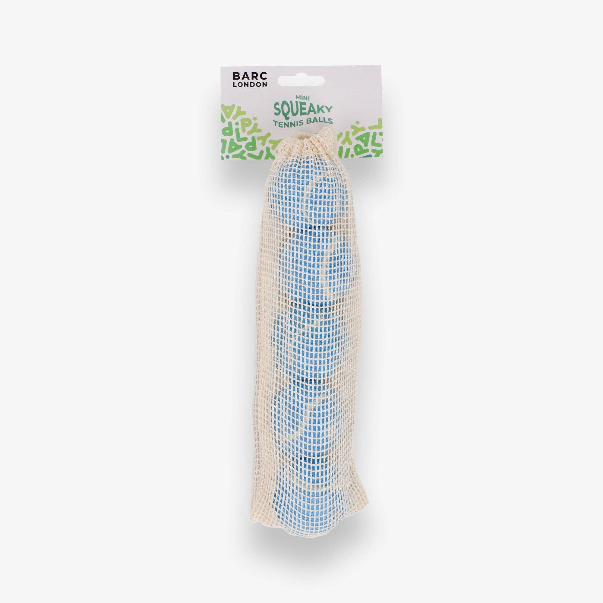 Blue Mini Dog Balls stored inside the Barc London net bag
