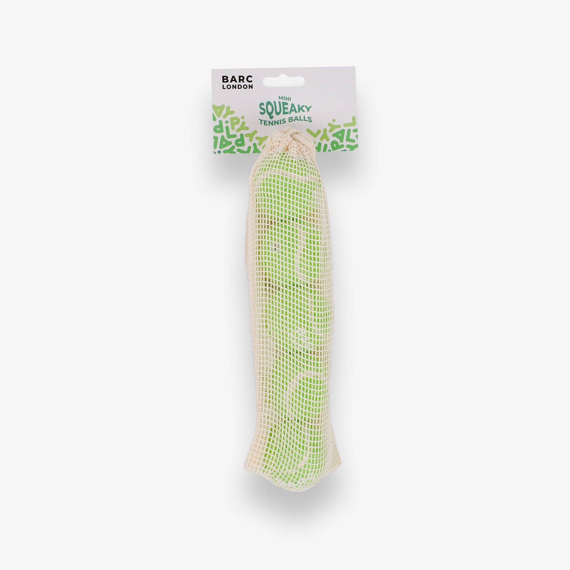 Lime Green Mini Dog Balls stored inside the Barc London net bag
Image 4
