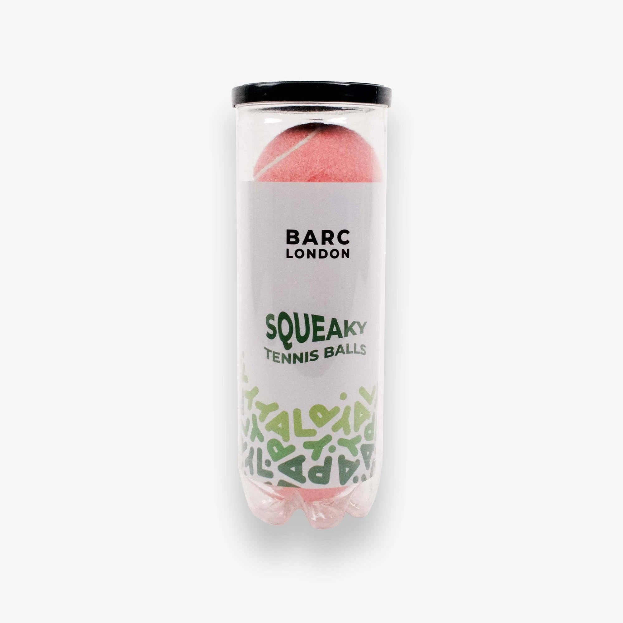 Pink Dog Balls stored inside reusable Barc London tube