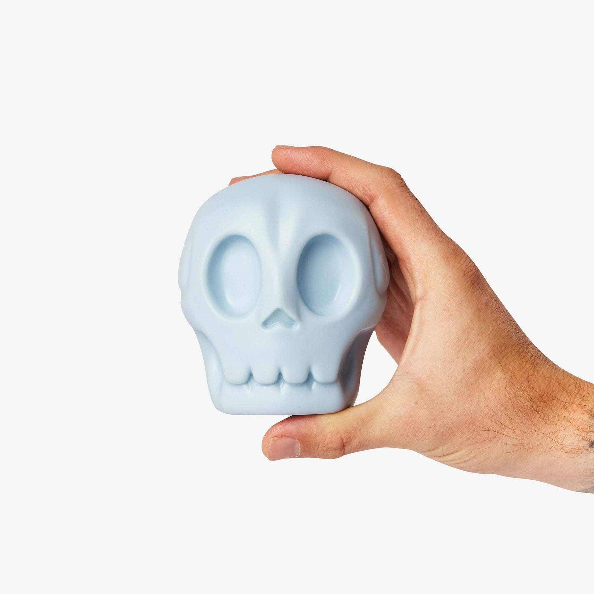Dog playing with the Skully Squeaky Dog Toy by Barc London