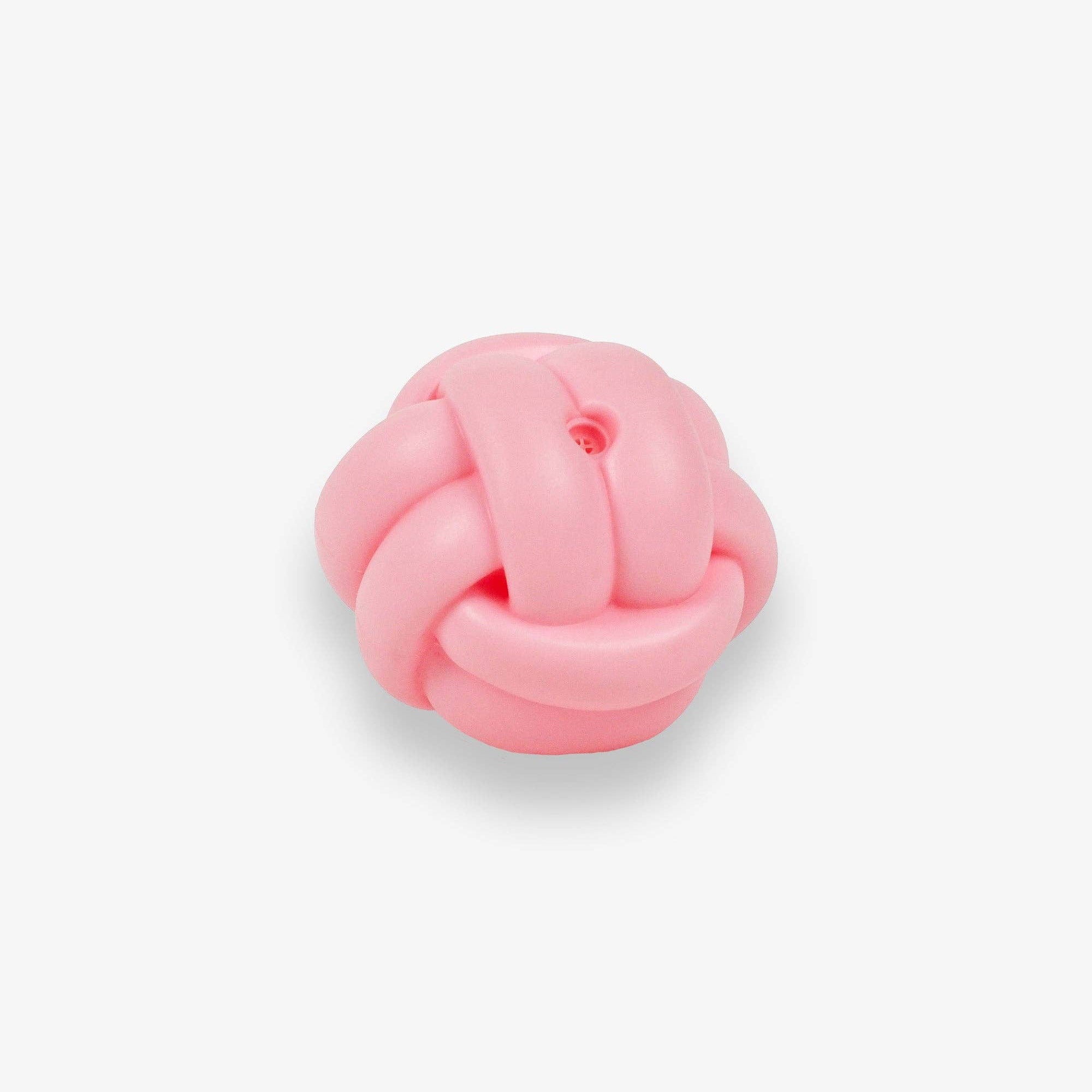 Side view of the Knotball Squeaky Dog Toy in pink
