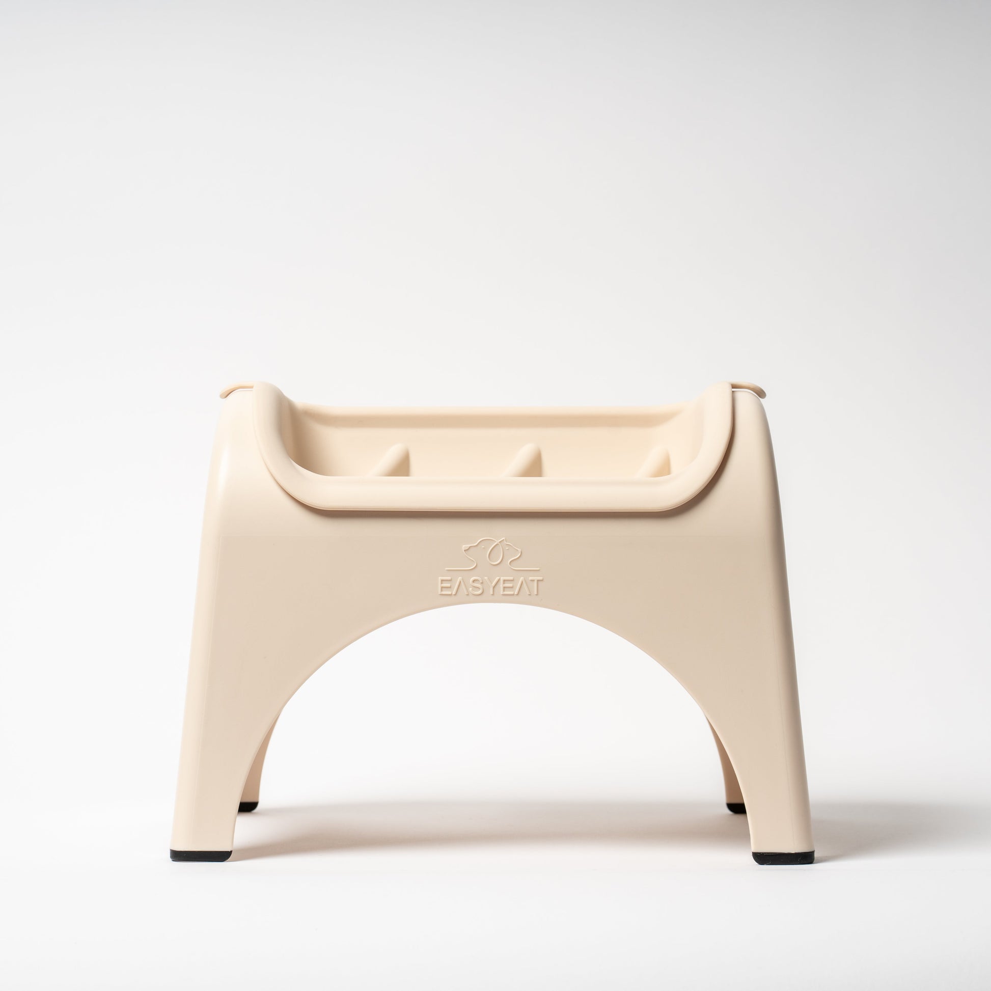 Beige plastic stool on a white background
