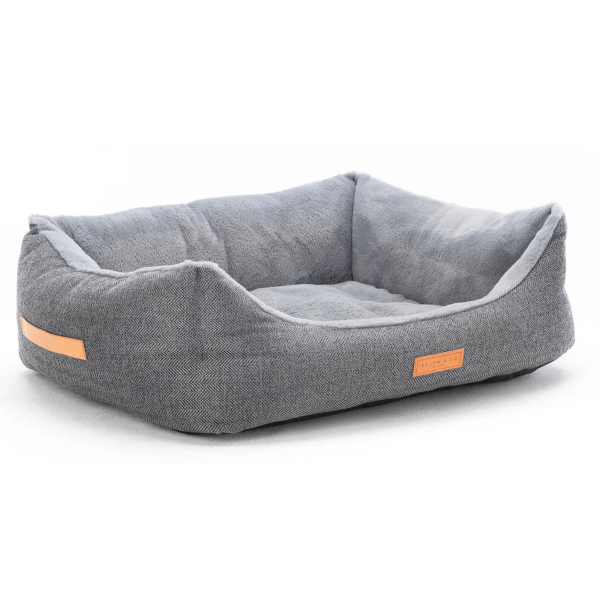 Gray pet bed with orange accents on a white background