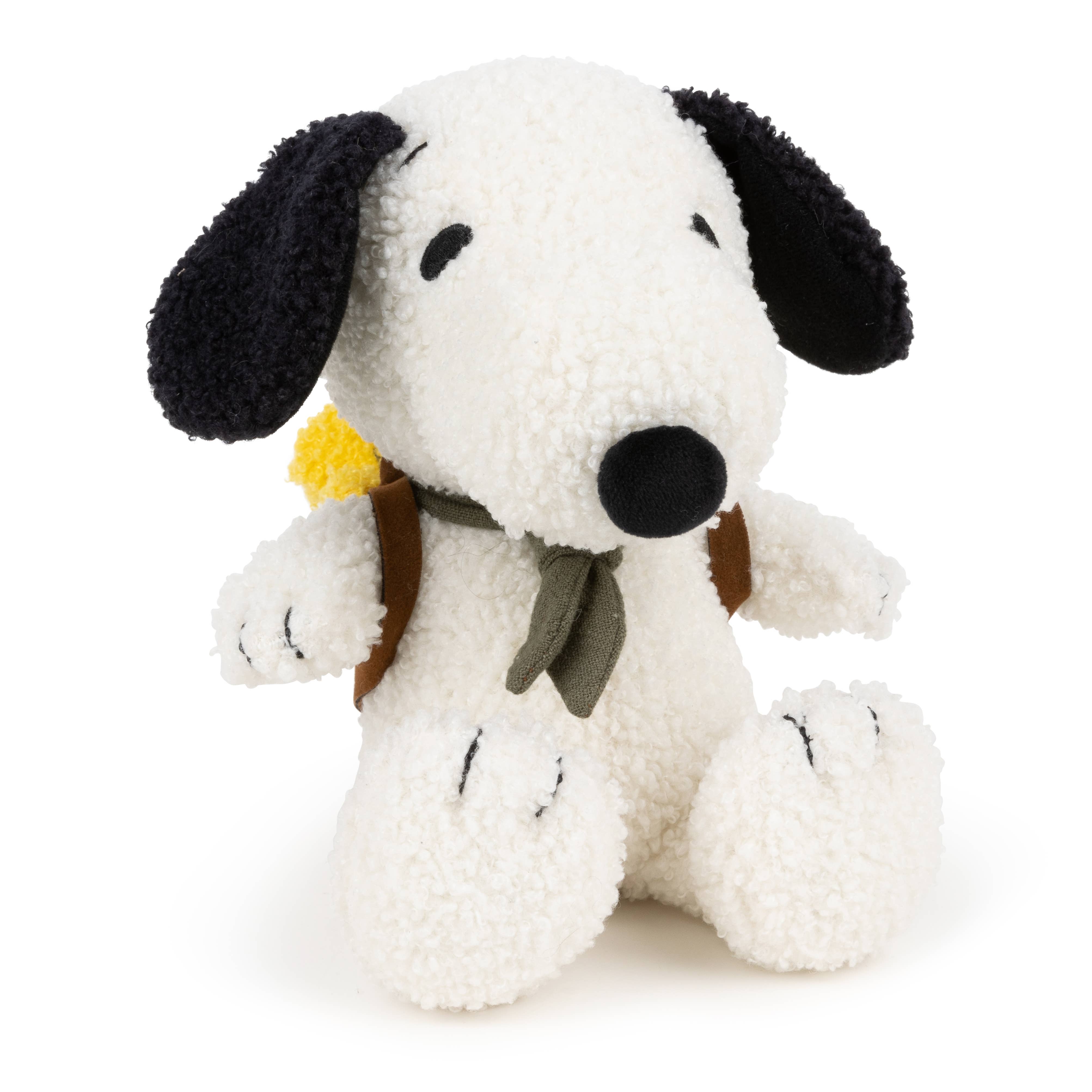 Close-up of Woodstock sitting inside Snoopy’s backpack