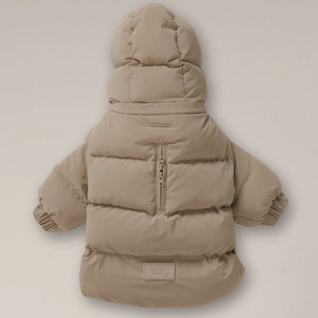 Beige puffer jacket on a light beige background
