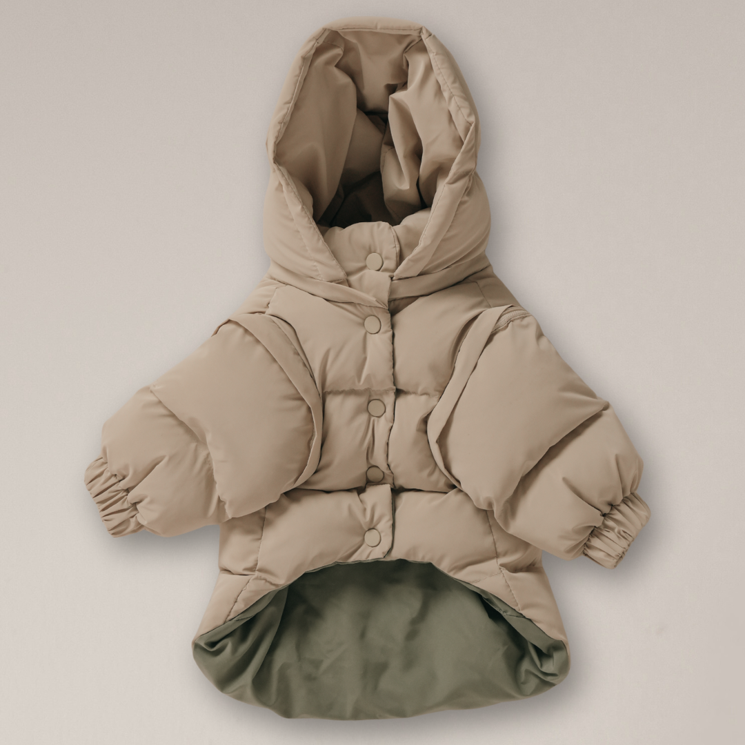 Beige puffer coat with a hood on a light gray background