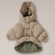 Beige puffer coat with a hood on a light gray background