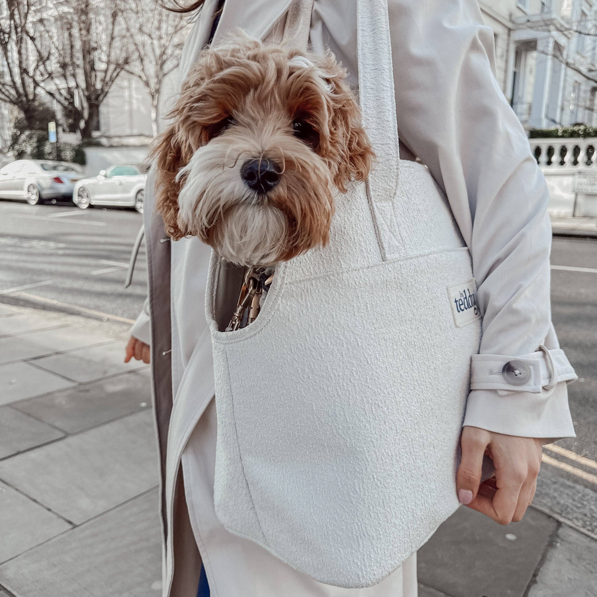 Marshmallow Bouclé Carrier worn over the shoulder