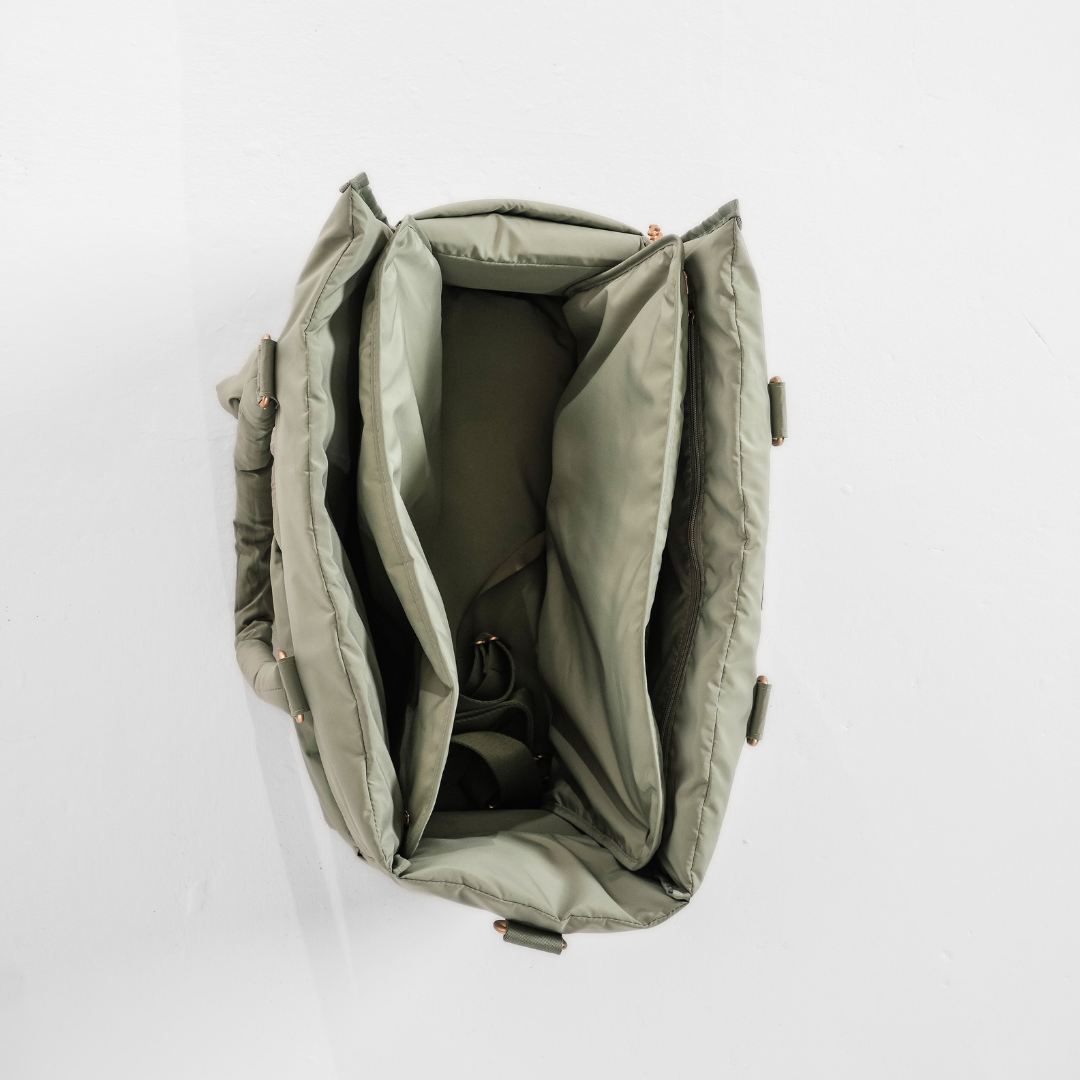 Close-up of the Matcha Puffer Carrier by BY TEDDY open 