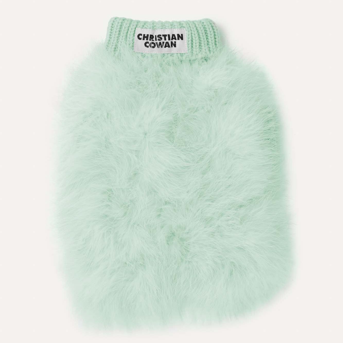 Light green fuzzy sweater with 'Christian Cowan' label on a white background